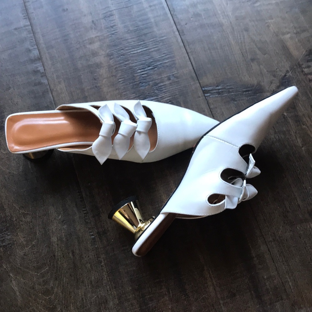 Brand new mules with golden heels